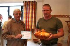 The monthly Highly commended Tony Handford received his certificate from Dave Reeks